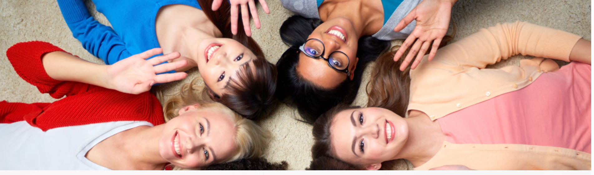 Group of Diverse Women Lying Down and Waving - Health and Psychological Assessments for Egg Donors